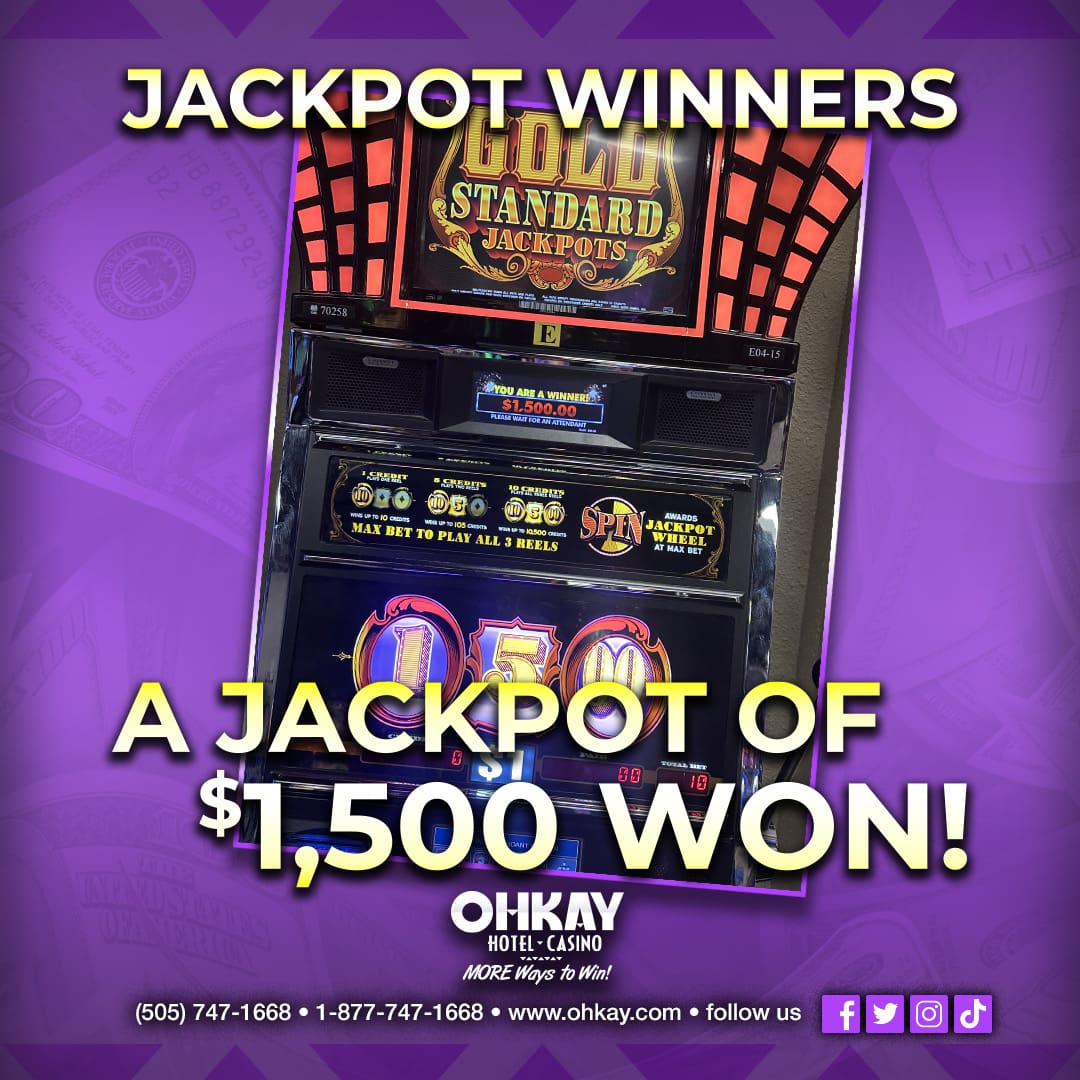 A purple slot machine with the words jackpot winners.