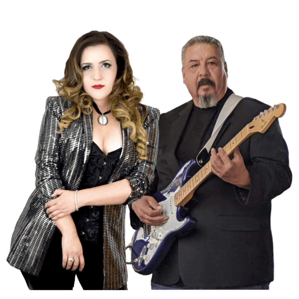 A man and woman standing next to each other holding guitars.