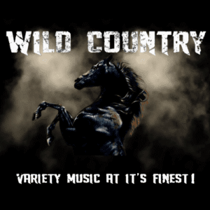 Wild Country music cover featuring a horse and bold text.