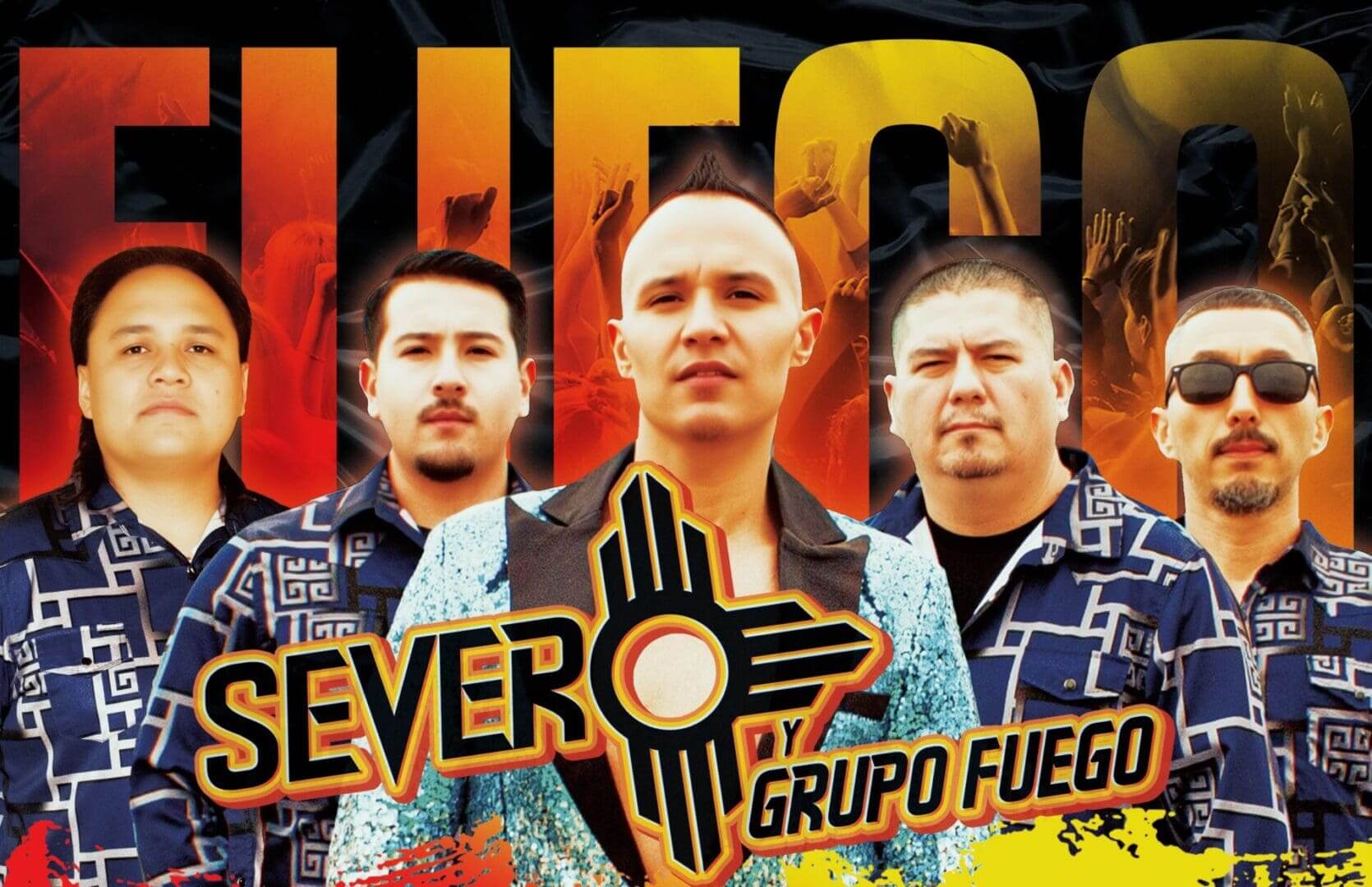 Band members posing with colorful background.