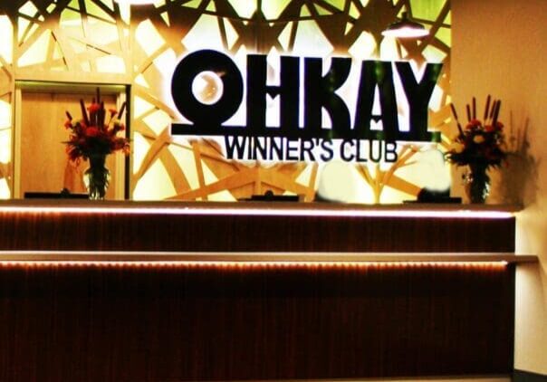 A lobby with a sign that says okay winner's lounge.